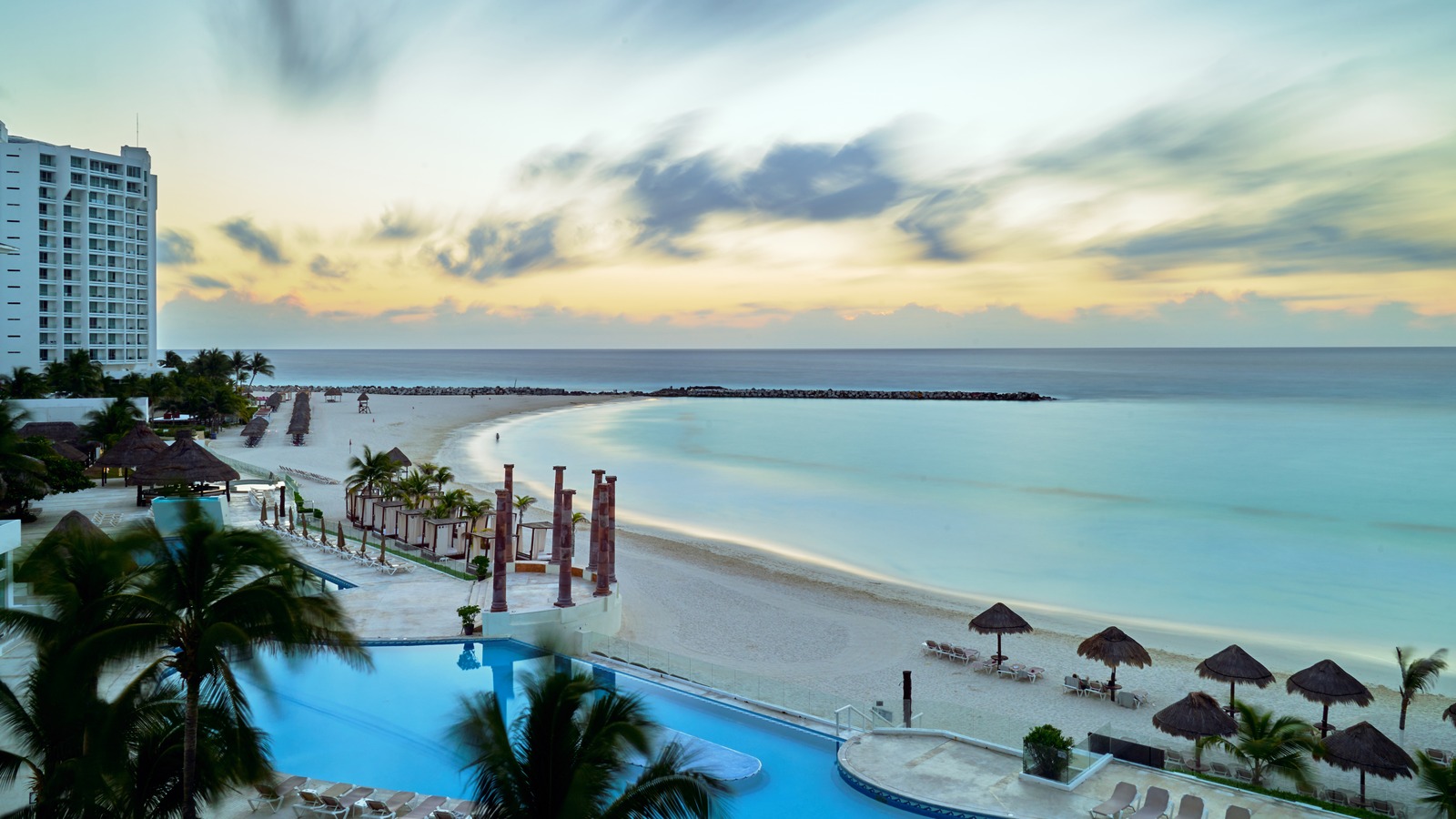 Historical view from Hotel Krystal Cancun across its pool and Caribbean beach