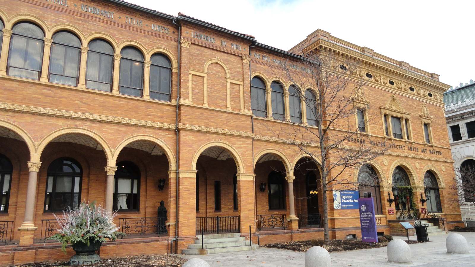 The arched brick and terra cotta facade of the George Walter Vincent Smith Art Museum in Springfield, Massachusetts.