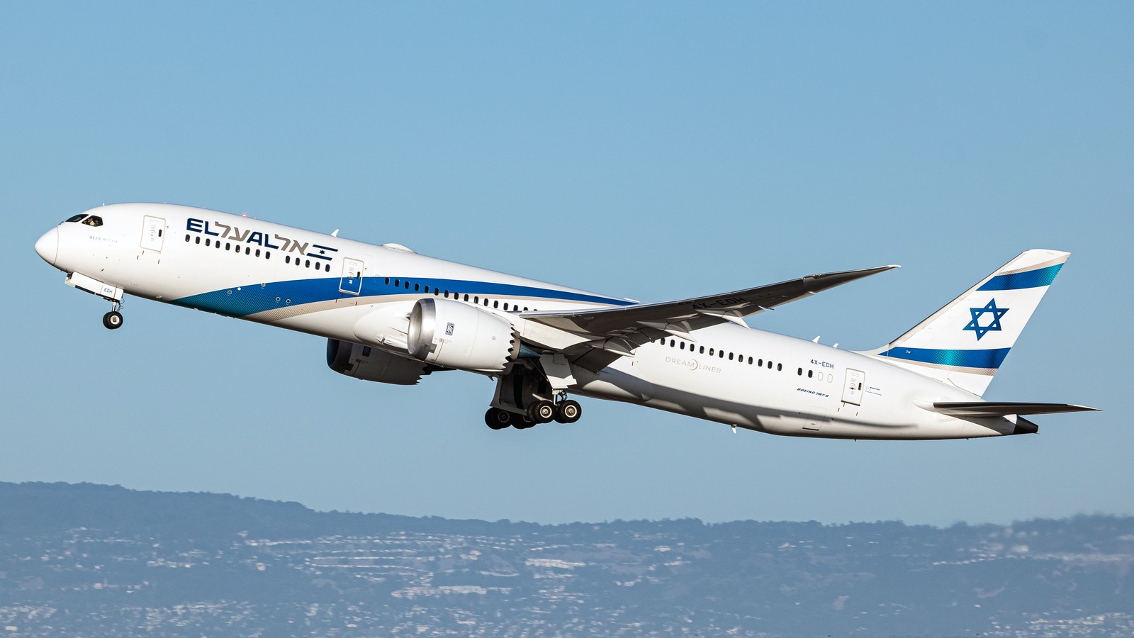 El Al Boeing 787-9 aircraft taking off in daylight, showing the El Al livery on the fuselage and tail.