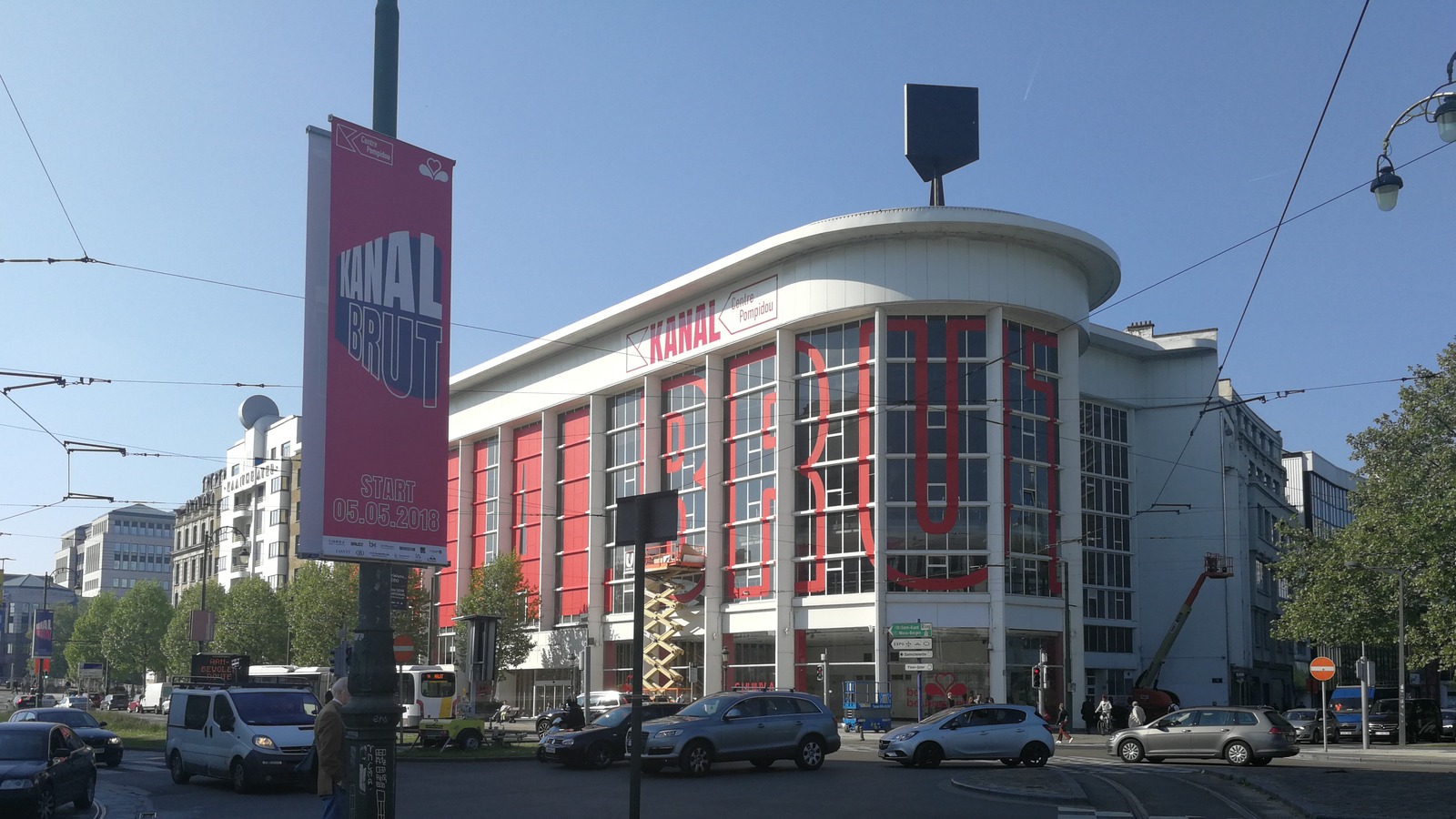 Exterior of the Kanal Centre Pompidou building in Brussels, the former Citroen garage with red KANAL lettering on the facade.