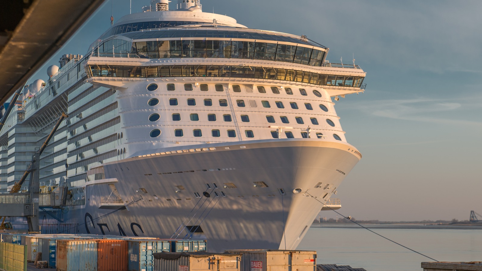 Odyssey of the Seas bow and superstructure docked at a cruise terminal in daylight