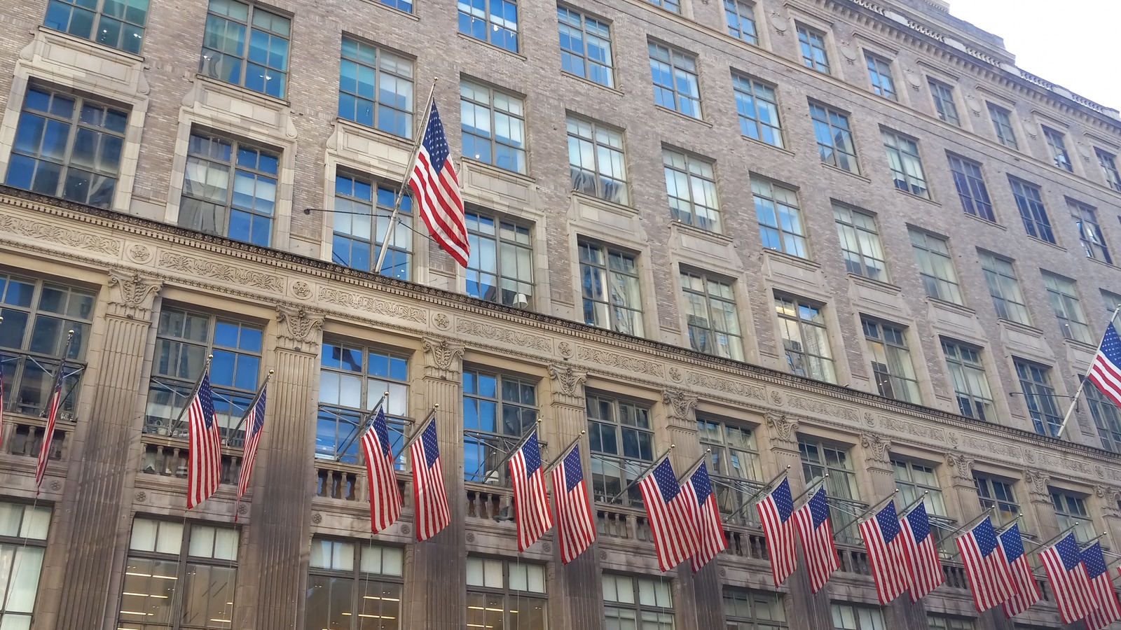 Saks Fifth Avenue facade in Midtown Manhattan in November 2024, an archival view of the affected corridor rather than the 2026 parade