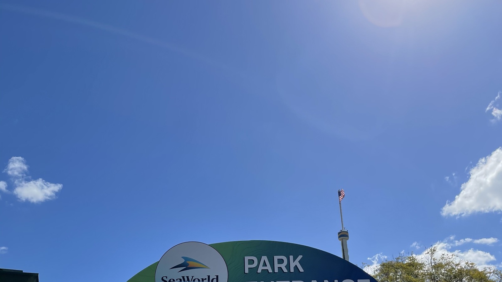 Entrance gate at SeaWorld Orlando with the Sky Tower behind it