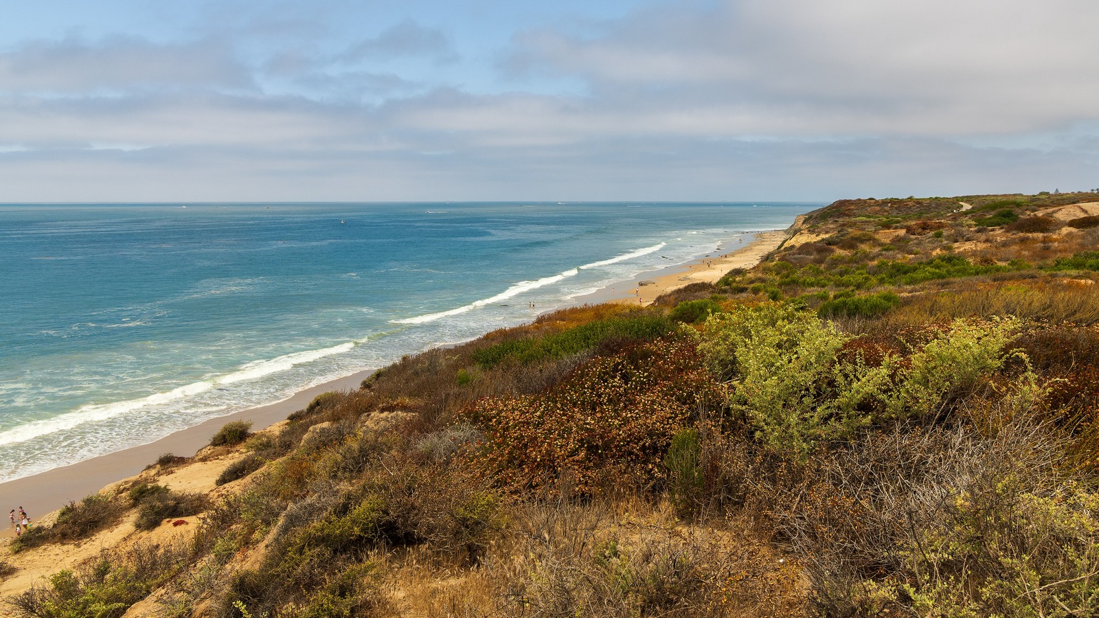 Coastal bluffs and beach at Crystal Cove in a June 2026 file photo taken before the storm erosion