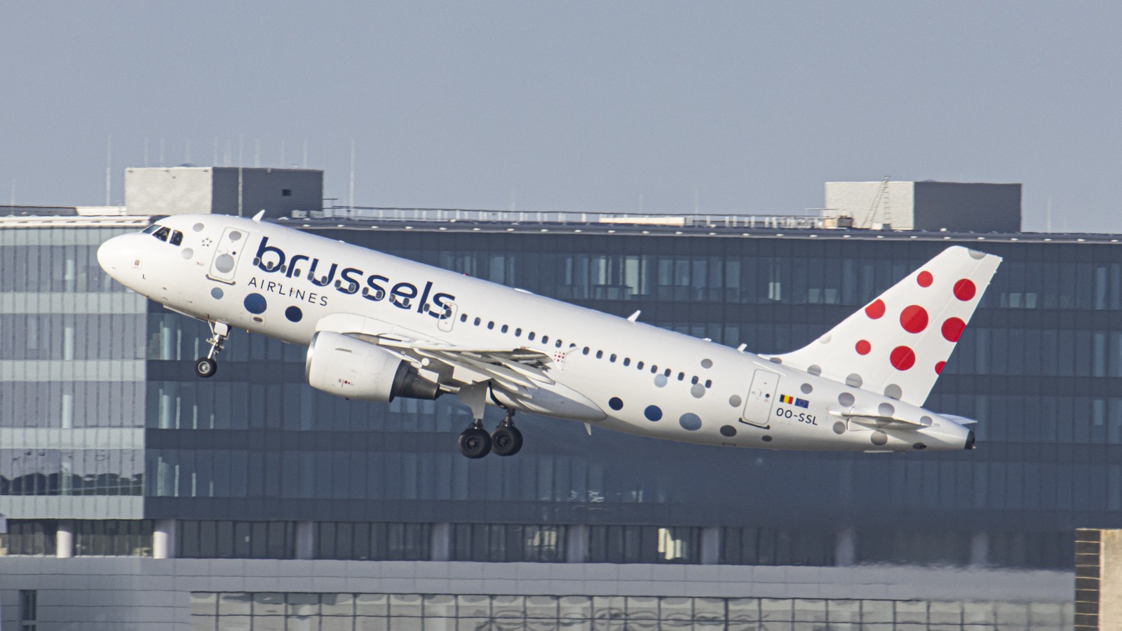 Brussels Airlines Airbus A319 in new livery taking off from Brussels Airport