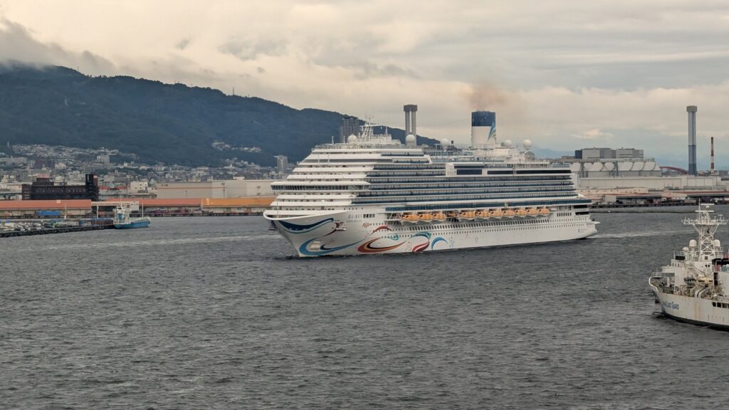 Adora Magic City cruise ship under way in the port of Kobe, Japan, in October 2025