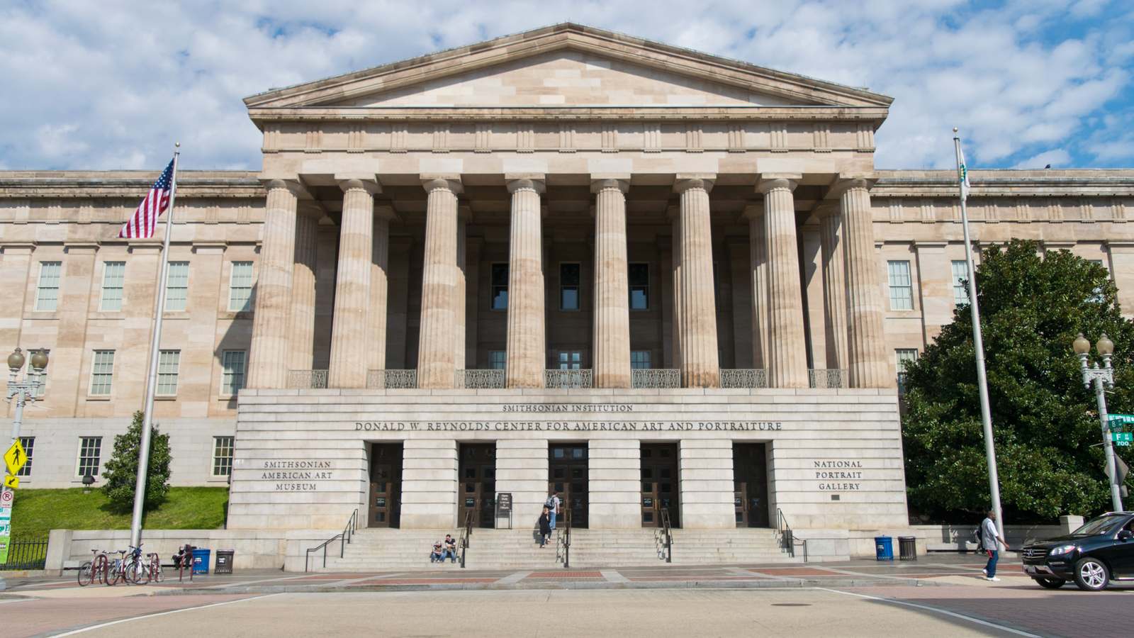 The columned F Street entrance of the National Portrait Gallery and Smithsonian American Art Museum building in Washington.