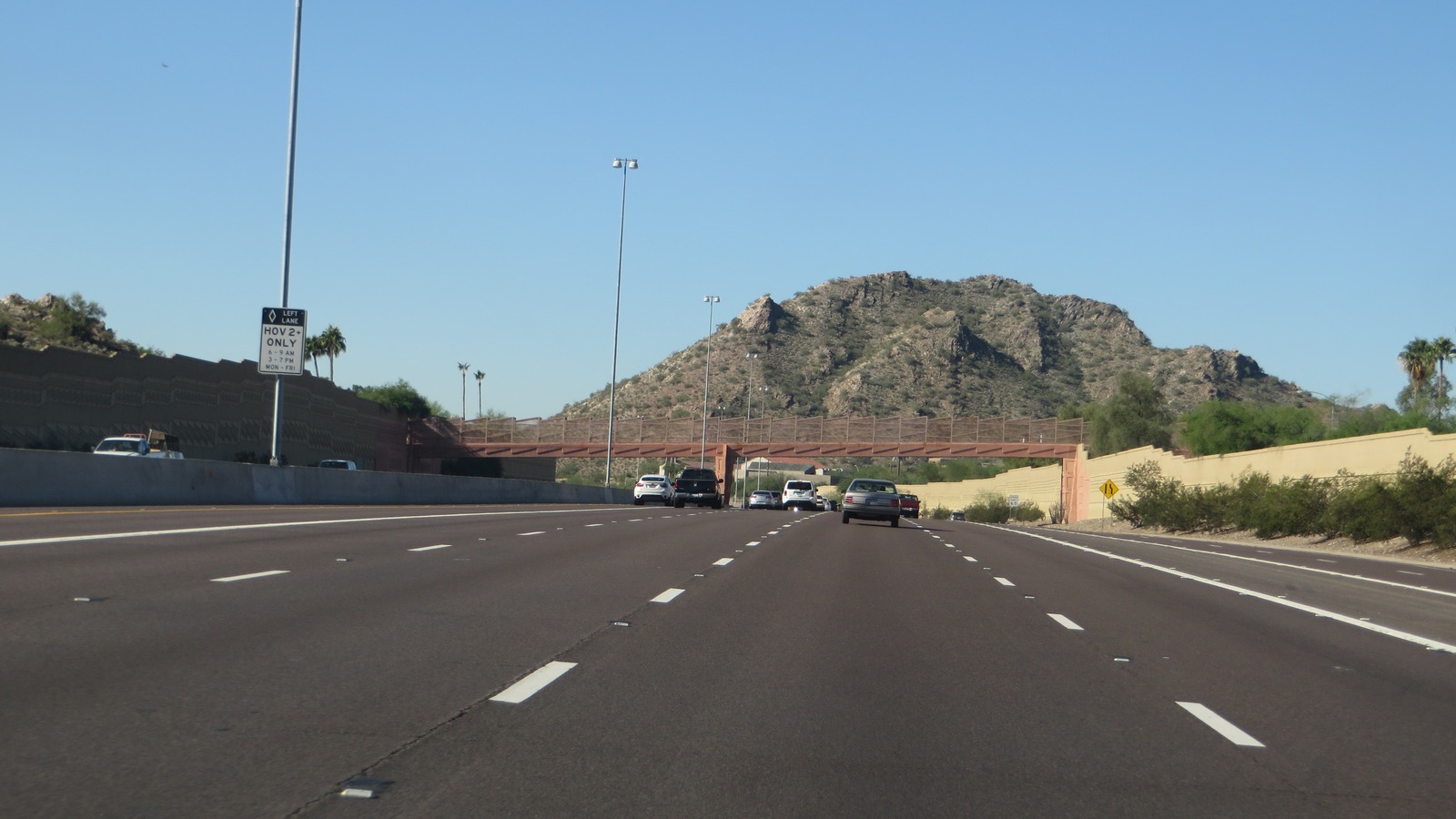 Northbound Piestewa Freeway, State Route 51, in Phoenix with Piestewa Peak ahead under a clear sky