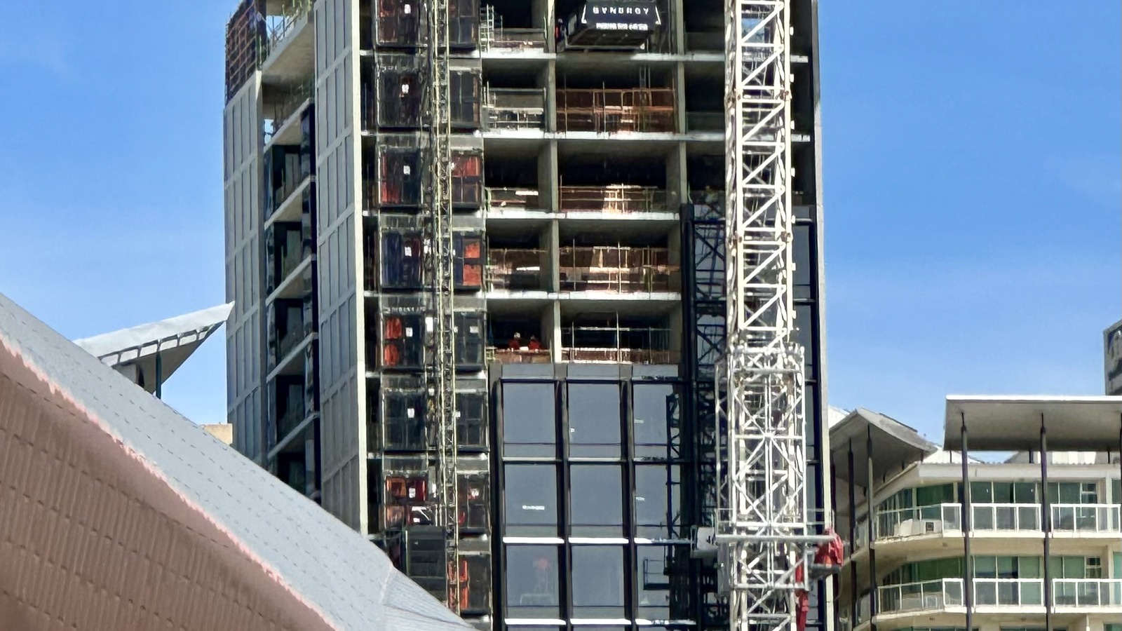 The Little National Hotel Adelaide tower on North Terrace, photographed topped out in October 2025 ahead of its October 6, 2026 opening.