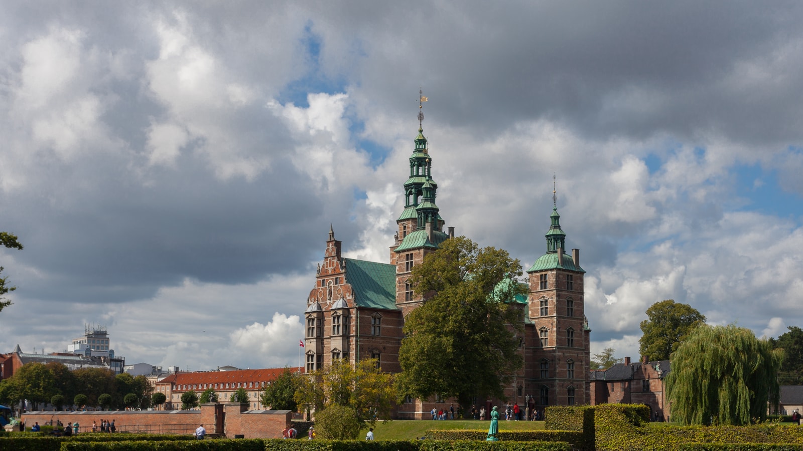 Rosenborg Castle’s red brick facade and copper green towers in Copenhagen