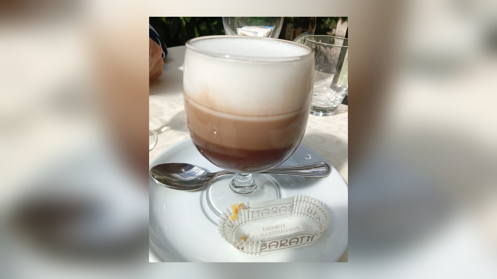 A full glass of bicerin served at Baratti & Milano in Turin